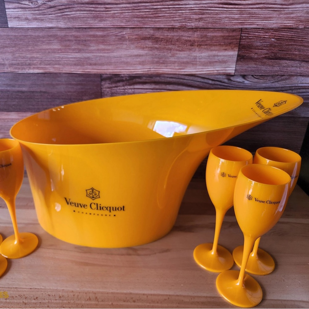 Veuve Clicquot ice bucket with 26 total flutes.